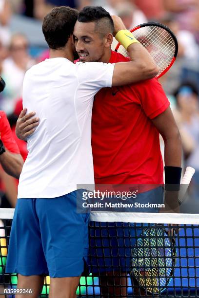 Grigor Dimitrov of Bulgaria is congratulated by Nick Kyrgios of Australia after their match during the men's final on day 9 of the Western & Southern...