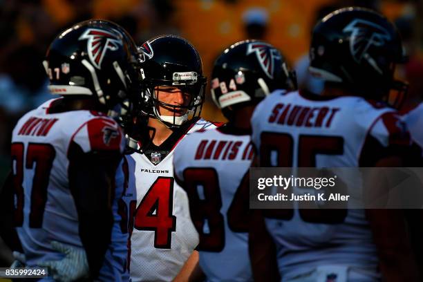 Matt Simms of the Atlanta Falcons looks on in the huddle in the second half against the Pittsburgh Steelers during a preseason game at Heinz Field on...