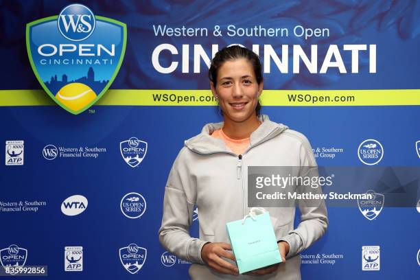 Garbine Muguruza of Spain is presented a special gift from the USTA after her win over Simona Halep of Romania during the women's final on day 9 of...