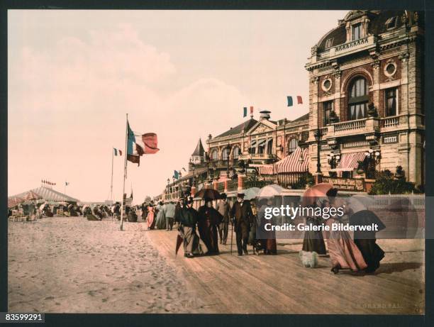 The promenade and Grand Salon in Trouville, France, circa 1900.