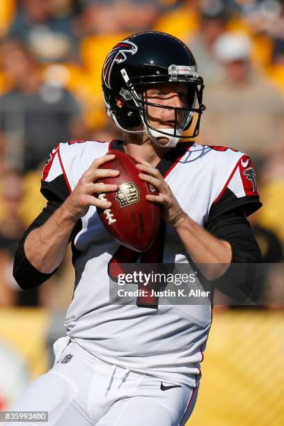 Matt Simms of the Atlanta Falcons drops back to pass against the Pittsburgh Steelers during a preseason game at Heinz Field on August 20, 2017 in...