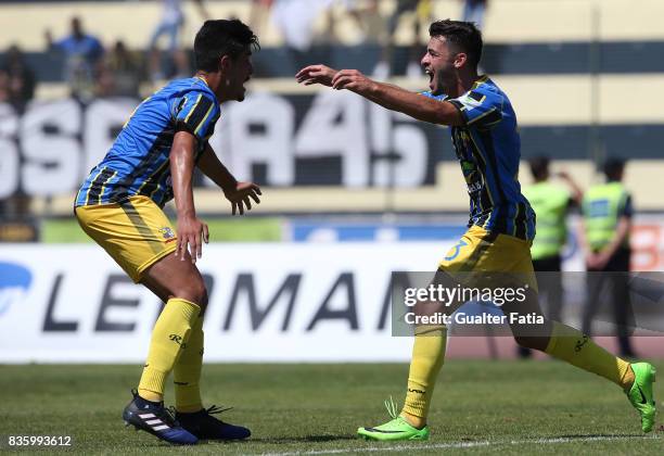 Real SC defender Jorge Bernardo from Portugal celebrate with teammate Real SC defender Joao Basso from Brazil after scoring a goal during the Segunda...