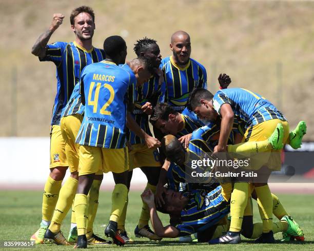 Real SC defender Jorge Bernardo from Portugal celebrate with teammates after scoring a goal during the Segunda Liga match between Real SC and...