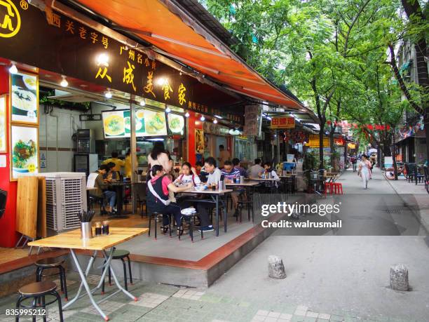 street cafes in the old city center of guangzhou. - guangzhou stock pictures, royalty-free photos & images