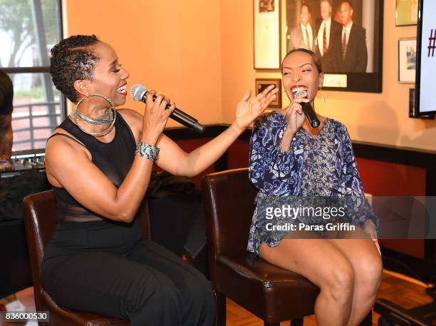 Singer Vivian Green and radio personality Maria More speak onstage at Upscale Magazine's Brunch Style featuring Vivian Green on August 20, 2017 in...