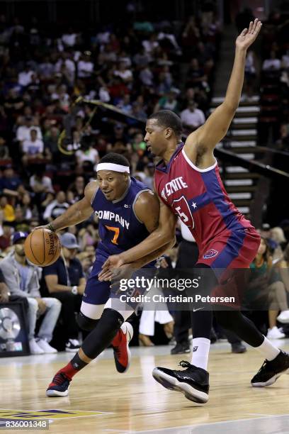 David Hawkins of the 3Õs Company handles the ball against Dominic McGuire of the Tri-State in week nine of the BIG3 three-on-three basketball league...