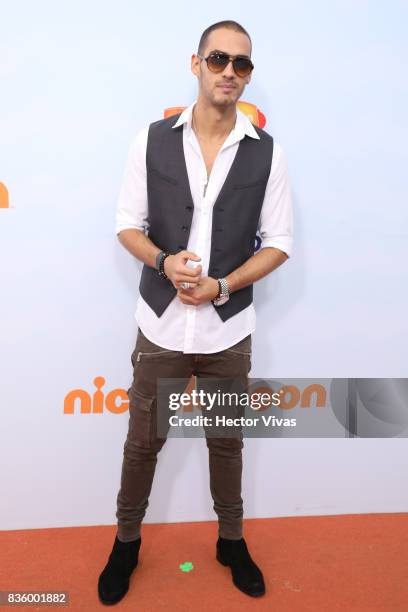 Mexican singer Mich Duval poses for pictures during the Kids Choice Awards Mexico 2017 Orange Carpet at Auditorio Nacional on August 19, 2017 in...