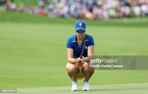 Jodi Ewart Shadoff of England and the European team in action against Lizette Salas of the United States team during the final day singles matches in...