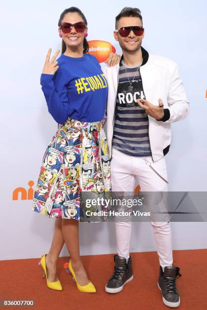 Livia Brito and her fiance Said pose for pictures during the Kids Choice Awards Mexico 2017 Orange Carpet at Auditorio Nacional on August 19, 2017 in...