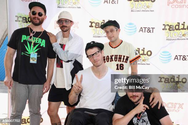 Jason Sechrist, John Gourley, Eric Howk, Kyle O'Quin and Zachary Carothers of the band Portugal. The Man pose at the Radio 104.5 Summer Block Party...