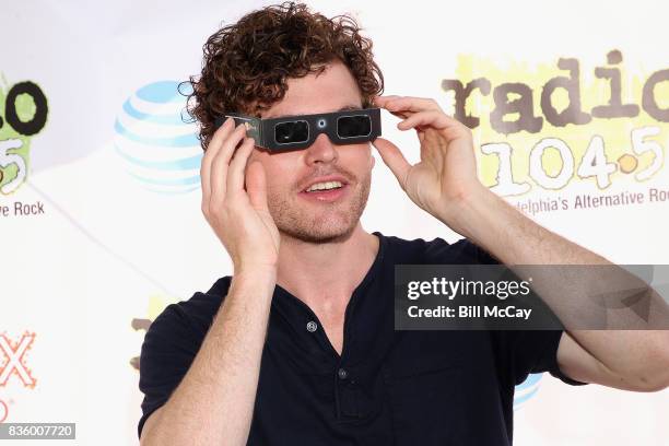 Vance Joy poses with Solar Eclipse glasses at the Radio 104.5 Summer Block Party August 20 , 2017 in Philadelphia, Pennsylvania