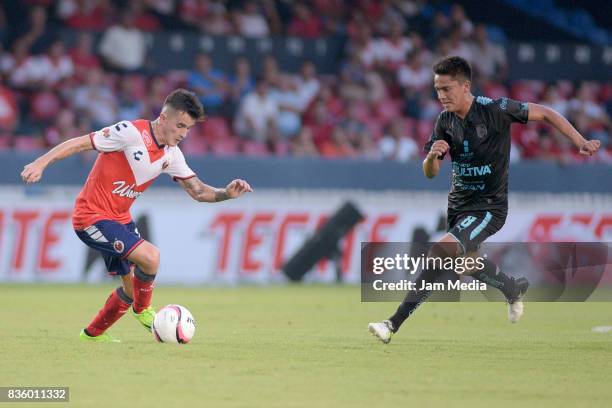 Adrian Luna of Veracruz and Javier Guemez of Queretaro fight for the ball, during the fifth round match between Veracruz and Queretaro as part of the...