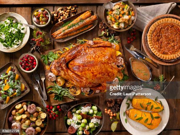 holiday turkey dinner - overhead view stock pictures, royalty-free photos & images