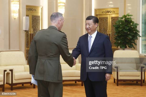 Chinese President Xi Jinping meets with visiting Chairman of the U.S. Joint Chiefs of Staff Joseph Dunford at the Great Hall of the People in...