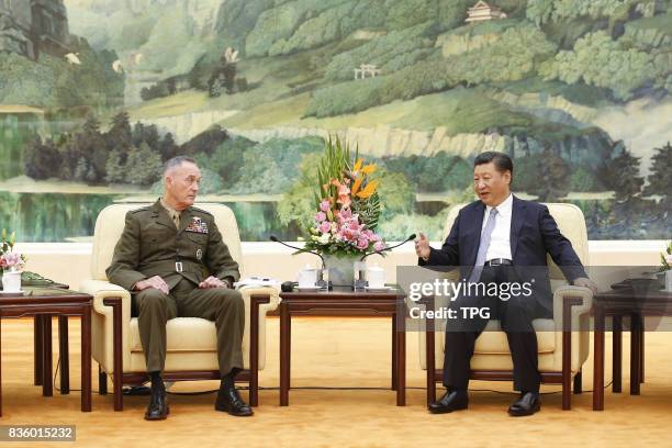 Chinese President Xi Jinping meets with visiting Chairman of the U.S. Joint Chiefs of Staff Joseph Dunford at the Great Hall of the People in...