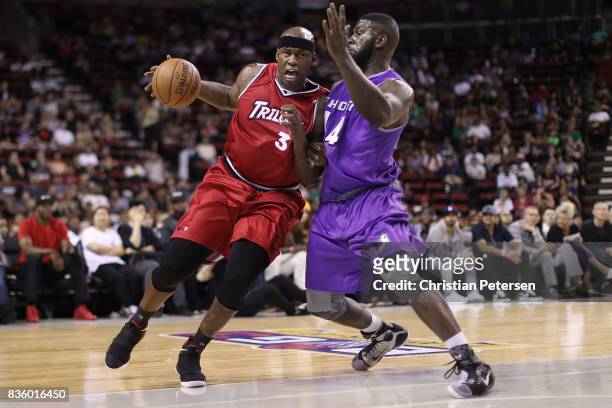 Al Harrington of the Trilogy handles the ball against Ivan Johnson of the Ghost Ballers in week nine of the BIG3 three-on-three basketball league at...
