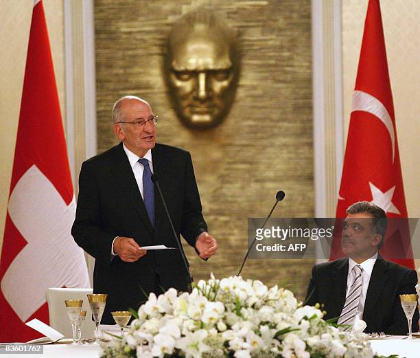 Turkish President Abdullah Gul and his Swiss counterpart Pascal Couchepin are pictured during an official dinner at the Cankaya Palace in Ankara on...