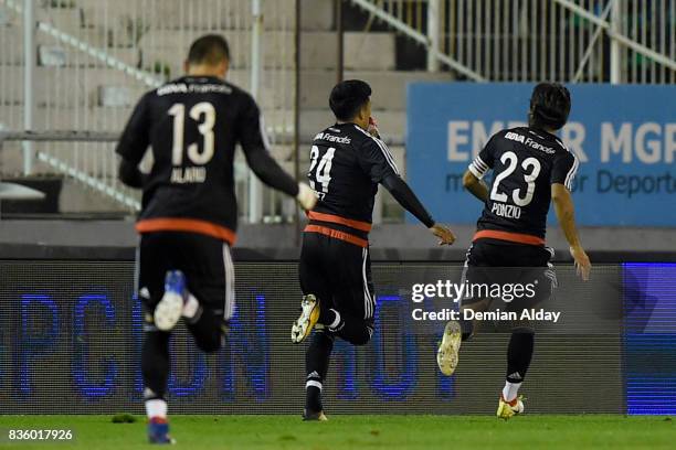 Enzo Perez of River Plate celebrates with teammates after scoring the second goal of his team during a match between River Plate and Instituto as...