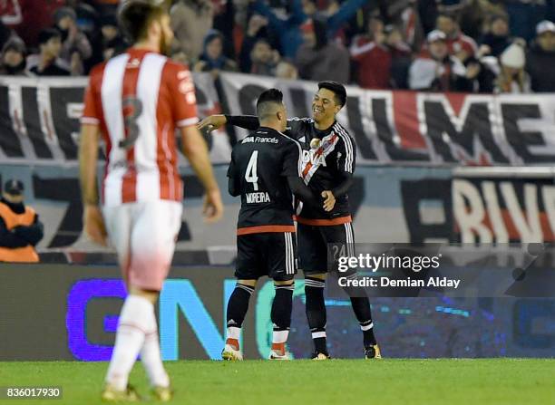 Enzo Perez of River Plate celebrates with teammate Jorge Moreira after scoring the second goal of his team during a match between River Plate and...