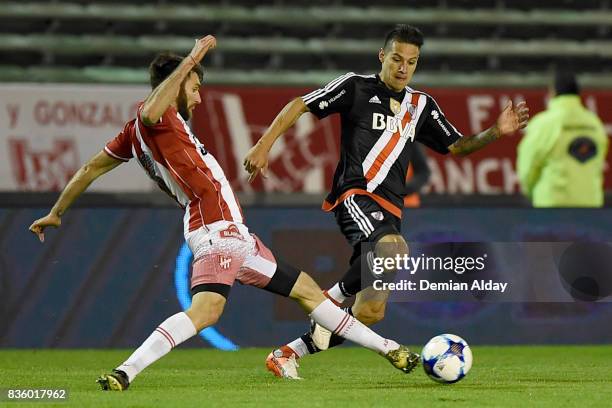 Carlos Auzqui of River Plate fights for the ball Esteban Goicoechea of Instituto during a match between River Plate and Instituto as part of round 16...