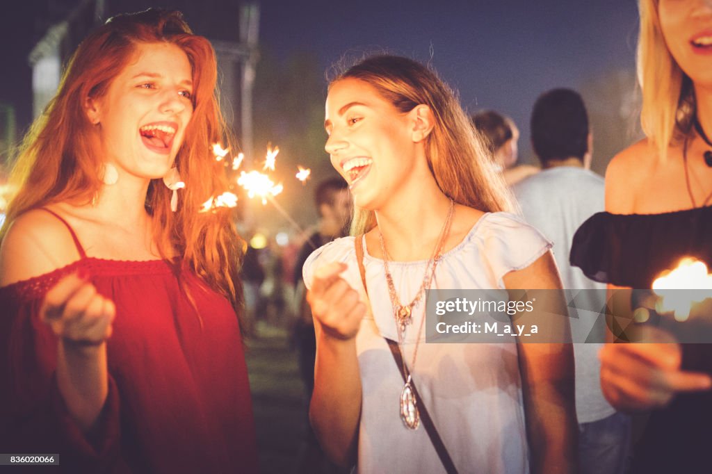 Best friends on summer festival