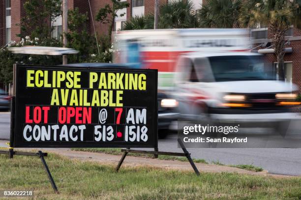 Traffic passes a sign for eclipse parking August 20, 2017 in Columbia, South Carolina. Columbia is one of the prime destinations for viewing Monday's...