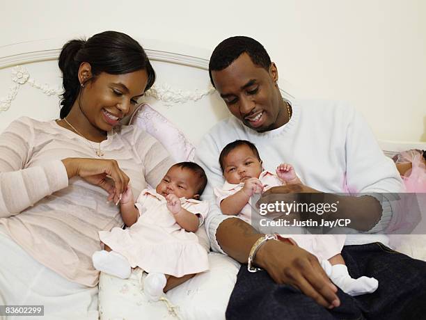 Sean Combs and Kim Porter at their home in New Jersey with twin baby daughters D'Lila Star and Jessie James on January 24, 2007. Credits: Kim...