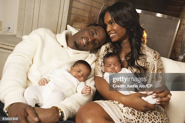 Sean Combs and Kim Porter at their home in New Jersey with twin baby daughters D'Lila Star and Jessie James on January 24, 2007. Credits: Kim...