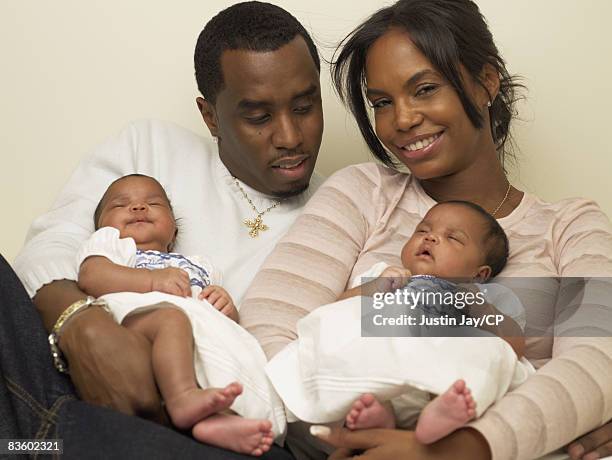 Sean Combs and Kim Porter at their home in New Jersey with twin baby daughters D'Lila Star and Jessie James on January 24, 2007. Credits: Kim...