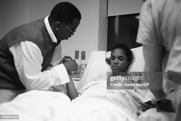 Sean Combs and Kim Porter before the birth of their twin daughters, Jessie James and D'Lila Star, on December 21, 2006 at Mt. Sinai hospital in New...