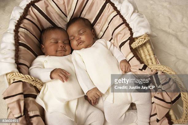 Sean Combs and Kim Porter's twin baby daughters D'Lila Star and Jessie James on January 24, 2007 at home in New Jersey. Credits: Make up: Merrell...