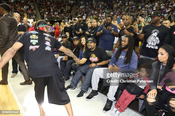 Co-founder Ice Cube and Richard Sherman of the Seattle Seahawks greets Allen Iverson of the 3Õs Company while attending week nine of the BIG3...