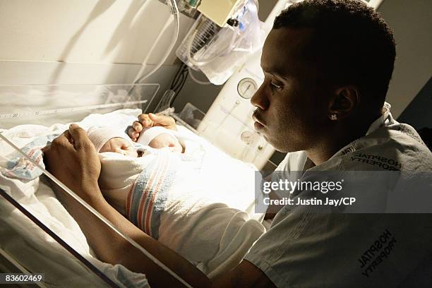 Sean Combs at Mt. Sinai hospital in New York, after Kim Porter gave birth to their twin daughters D'Lila Star and Jessie James on December 21, 2006