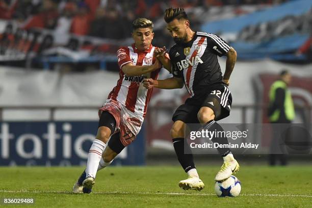 Ariel Rojas of River Plate fights for the ball Emiliano Endrizzi of Instituto during a match between River Plate and Instituto as part of round 16 of...