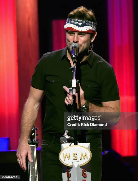 Singer/Songwriter Charles Esten wears Wynonna Judd head band on stage during Grand Ole Opry Total Eclipse 2017 Special Sunday Night Show at Grand Ole...