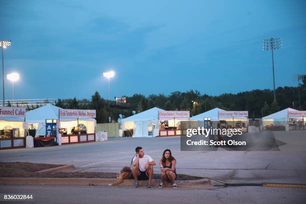 Attendance was light during a concert and carnival on the campus of Southern Illinois University the evening before Monday's solar eclipse on August...