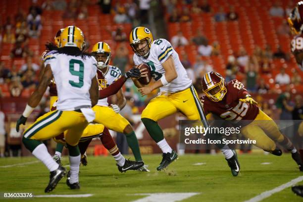 Green Bay Packers Quarterback Taysom Hill scrambles for a touchdown during the NFL preseason game between the Green Bay Packers and the Washington...