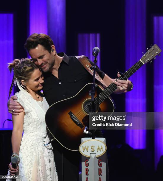 Singer/Songwriter/Actor Clare Bowen joins Singer/Songwriter/Actor Charles Esten on stage during Grand Ole Opry Total Eclipse 2017 Special Sunday...