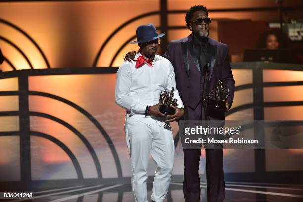 Singer-songwriter Damion Hall and Teddy Riley of Guy accept an award onstage at the 2017 Black Music Honors at Tennessee Performing Arts Center on...