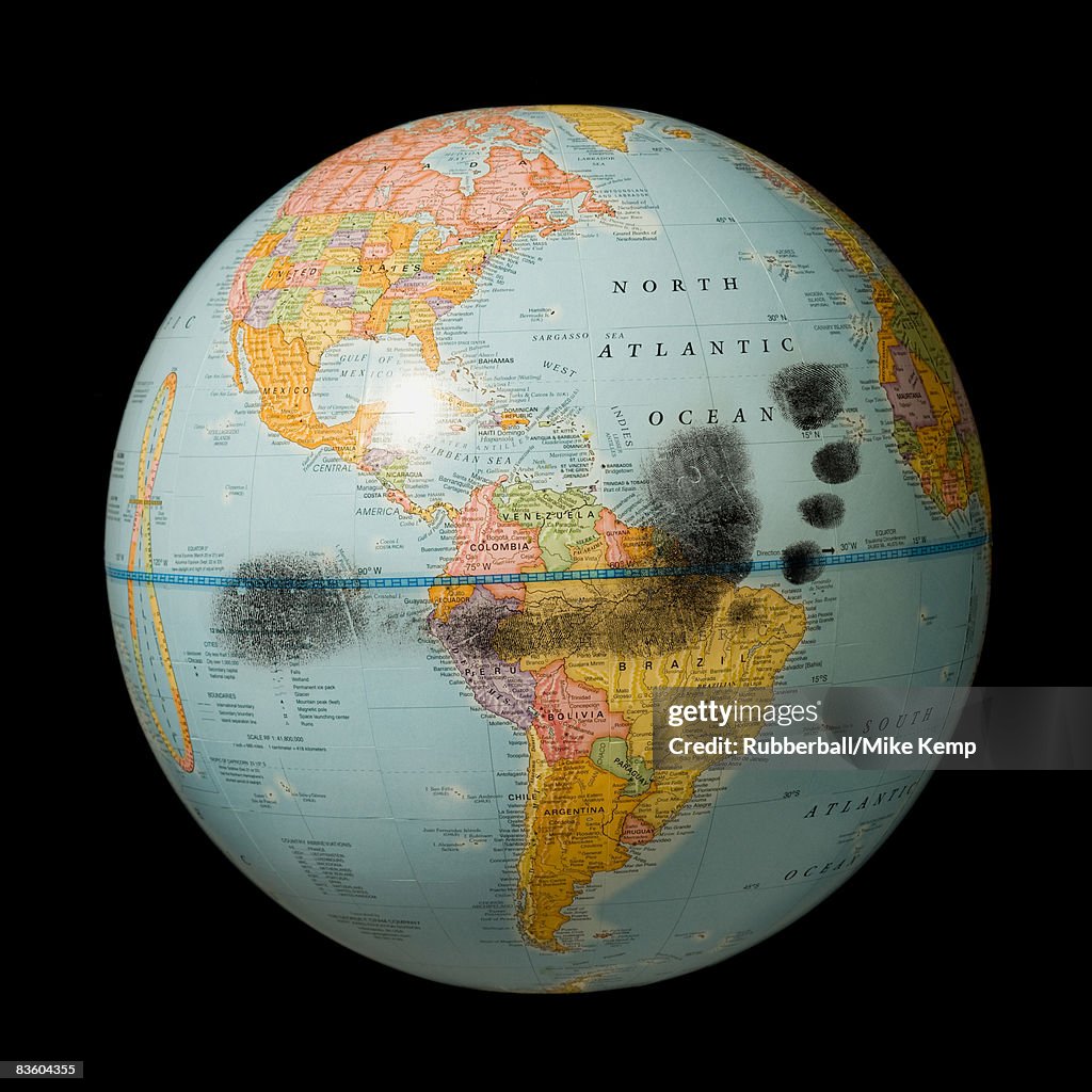 Footprint on a globe.