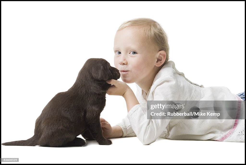 Child with puppy