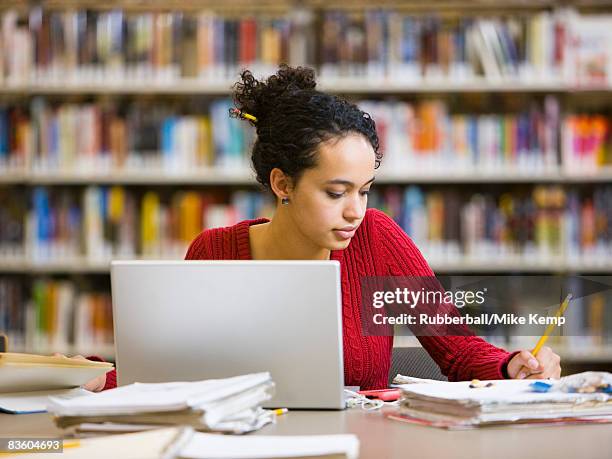 in the library - studying library stock pictures, royalty-free photos & images