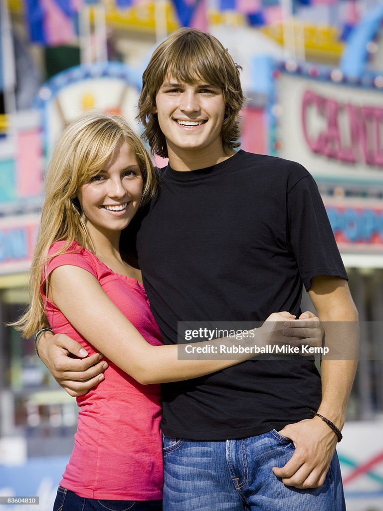 Young couple at an amusement park