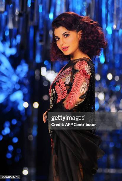 Indian Bollywood actress Jacqueline Fernandez showcase a creation by designer Manish Malhotra during the grand finale of Lakme Fashion Week...