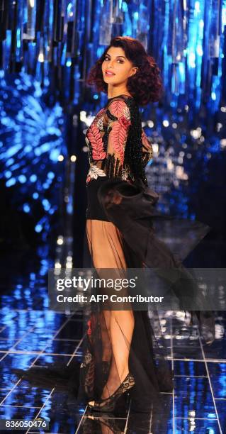 Indian Bollywood actress Jacqueline Fernandez showcase a creation by designer Manish Malhotra during the grand finale of Lakme Fashion Week...