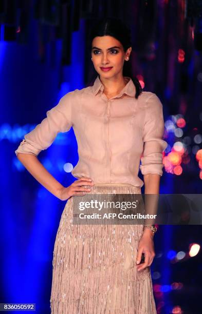 Indian Bollywood actress Daina Penty poses for a photograph during the grand finale of Lakme Fashion Week Winter/Festive 2017 in Mumbai on August 20,...