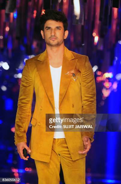 Indian Bollywood actor Sushant Singh Rajput poses for a photograph during the grand finale of Lakme Fashion Week Winter/Festive 2017 in Mumbai on...