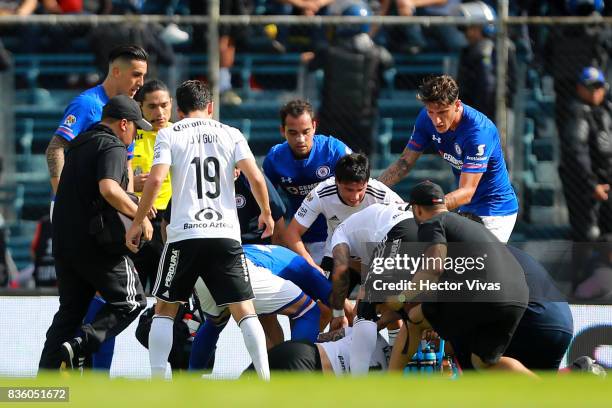 Milton Caraglio of Atlas gets injured during the fifth round match between Cruz Azul and Atlas as part of the Torneo Apertura 2017 Liga MX at Azul...