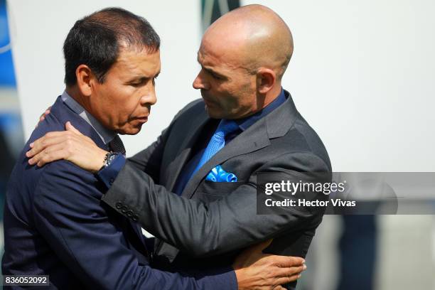 Jose Cruz, Head Coach of Atlas greets Francisco Jemez, Head Coach of Cruz Azul during the fifth round match between Cruz Azul and Atlas as part of...