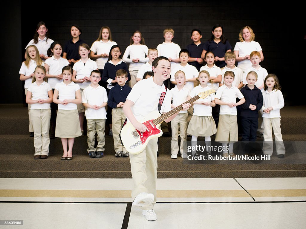 Elementary school children performing